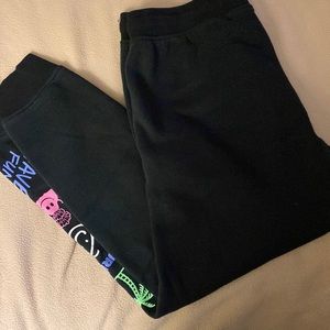 Mens Hurley joggers - black with design on one pant leg